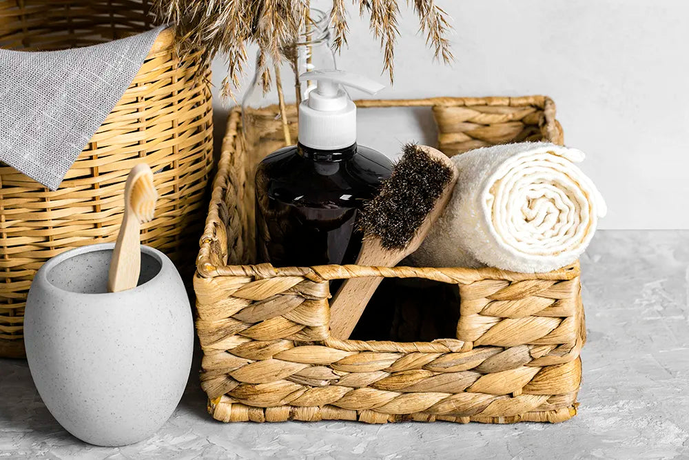 eco-friendly-cleaning-products-set-basket-with-brushes-toothbrush copy-bathroom rattan