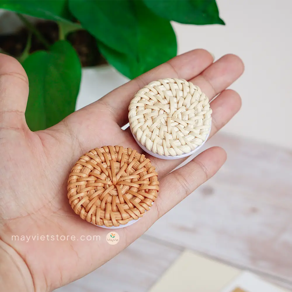 Handwoven rattan phone stand, phone holder, and pop socket in a minimalist design. Perfect for adding a touch of bohemian style to your home or office, or for using on the go.