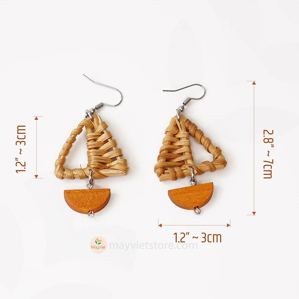 A pair of handcrafted rattan earrings with mini triangular brown wooden beads, made by Mayvietstore. The earrings are made of high-quality rattan and wood, and are lightweight and comfortable to wear. The mini triangular beads add a touch of delicate and minimalist style to the earrings, and the brown wooden beads give them a warm and natural look. These earrings are perfect for any occasion, from a casual day out to a special event.