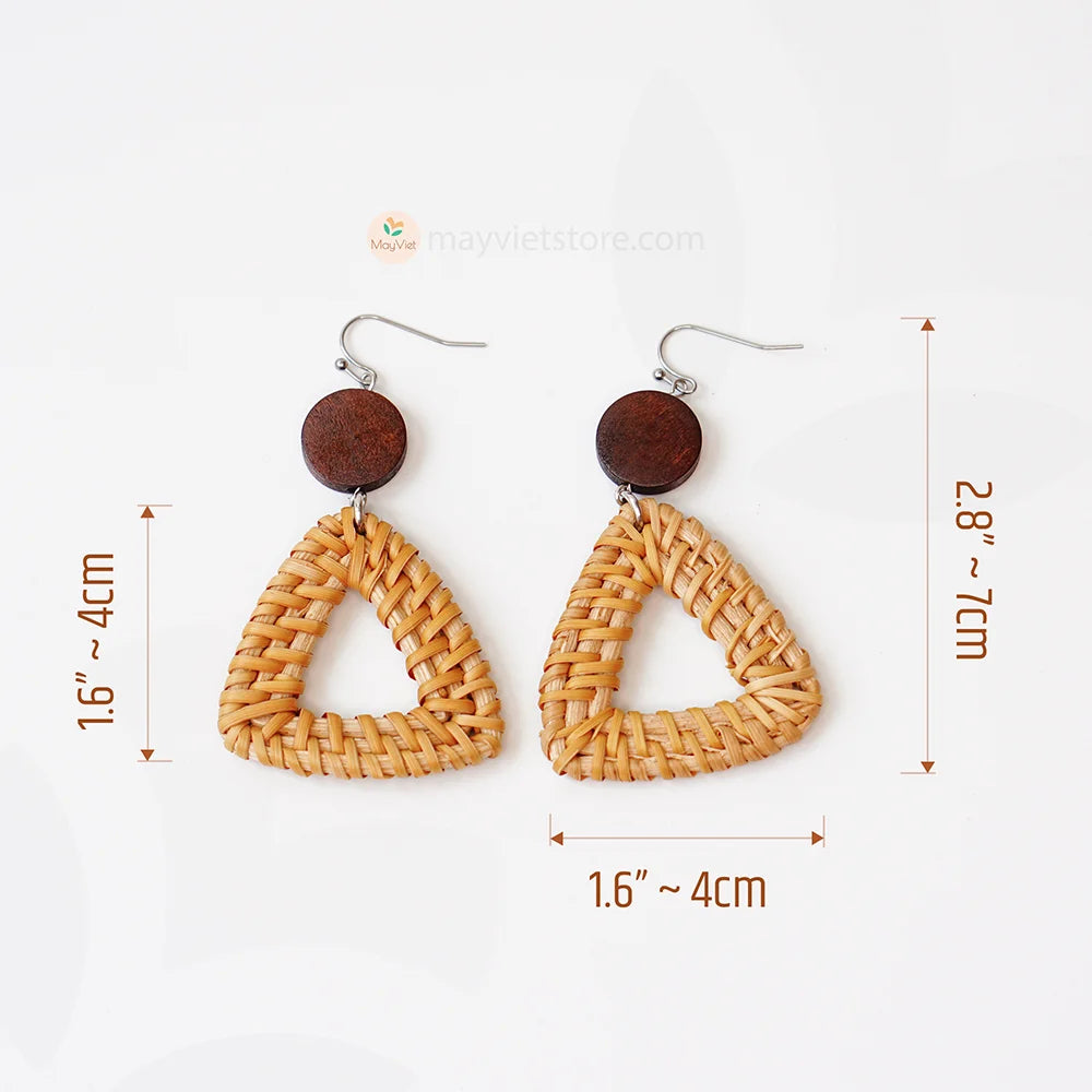 A pair of handcrafted rattan earrings with triangular brown wooden beads, made by Mayvietstore. The earrings are made of high-quality rattan and wood, and are lightweight and comfortable to wear. The triangular beads add a touch of geometric interest to the earrings, and the brown wooden beads give them a warm and natural look. These earrings are perfect for any occasion, from a casual day out to a special event.